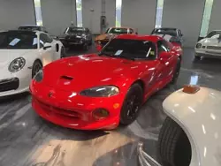A stunning 1997 Dodge Viper GTS in Viper red. 19,000 original miles. Upgraded rims and exhaust. Never abused, and...