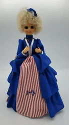 Brinns 1986 collectible edition July musical doll. she is in beautiful condition, clean.