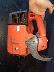 Husqvarna Chainsaw. No coil. No handle. No starter side cover. Bad flywheel