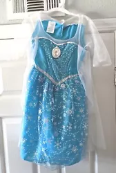 Frozen Elsa Musical Light Up Dress ~ Plays Let It Go~Glittered~ Girls 4-6. Very good used condition. Lights and music...