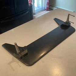 Four short silver machine screws and four long black machine screws. Panasonic TH50PE700U TV Stand Base - removed from...