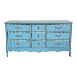 This dresser is professionally refinished in robin egg blue with antique glaze and gold painted accents. This dresser...