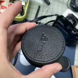 For Leica Every production process of Leather Lens Cap is made by hand. The cap is crafted from the first layer of...