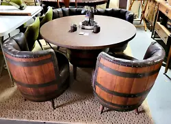 It has been in the family since the 70s and well taken care of. The table is made from a half oak barrel with 4...