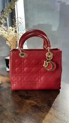 Beautiful red lady dior Comes with authentication paper Please read full description and ask any questions before...