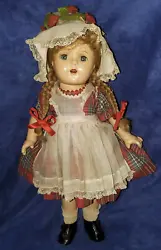 This is a vintage Madame Alexander McGuffey Ana doll with a Princess Elizabeth face.  She is approx. 16
