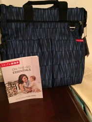 As photographed. Grab handles and adjustable shoulder strap with slip-on shoulder pad. BPA-free and Phthalate-free. •...