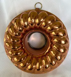For sale is this Antique Copper with tin lining Cake or Jello Mold. It has a brass original hanger to hang it for...