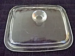 Very clear Glass with no noticeable scratches but has a very small chip on the lip. Fits the Corningware P-4-B Loaf Pan.