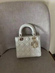 The Lady Dior bag epitomizes Diors vision of elegance and beauty. I.O.R. charms further embellish its silhouette. The...