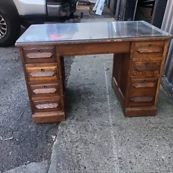 Pretty Quartersawn oak desk. 48” x 31” high x 27” deep. Top has leather AND tempered glass. WE now have a...