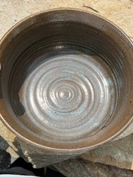 Gorgeous swirl at the inner midpoint. Nice glaze. Use as a mixing bowl, serving bowl, etc.