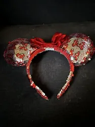 Minnie Mouse Ear headband red sequin and red bow. No damage. Sequins in tact. Gently used.