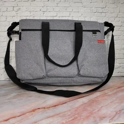 Skip Hop Duo Double Signature Diaper Bag. Heather gray in color. Featuring 16 pockets, it fits everything you need and...