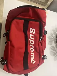 This Supreme backpack in vibrant red is the perfect accessory for any fashion-forward man. It boasts ample space to...