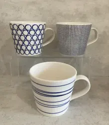 Beautiful mugs inspired by the sea. Crafted from durable white porcelain with unique indigo designs. Color combo is...