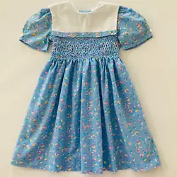 Hand smocked. Size: 6X girls. Polyester, cotton.