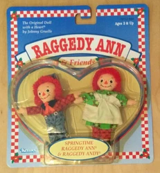Raggedy Ann & Andy play set that is still mint in box but there Is a minimal crease back bottom left corner, and 2...