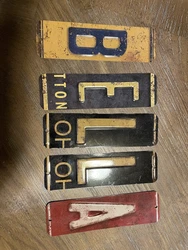 Bella metal letters.