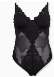 Here is a gorgeous Torrid plus sized bodysuit or sleep teddy in black. It is a 4X and will make you feel like a...