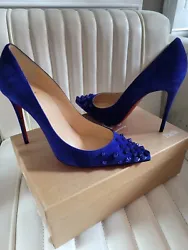 The pointed toe shape and ultra-high stiletto heel style provide a sleek and elegant look, while the blue color and...