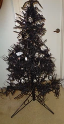 Also, a rubber bat at the top of the tree. 4 Feet Tall.
