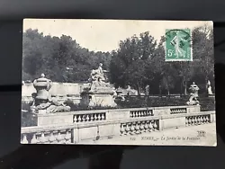 carte postale ancienne / NIMES - LE JARDIN DE LA FONTAINE. CARTE MANUSCRITE AU DOS , BON ÉTAT GÉNÉRAL.État :...