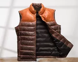 The vest features a quilted down puffer design, making it not only a stylish choice but also a practical one for those...