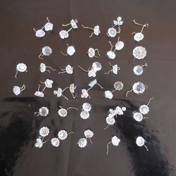Matériaux : verre cristal, chaque papille est percée en son centre. Un certificat d’authenticité valant facture...