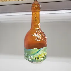 Wine Bottle Wind Chime Hand-crafted And Painted In Summer Fall Colors. This beautiful re-purposed bottle is in...