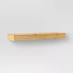 •24in floating wall shelf •Solid wood construction •Great for storage and display •Hanging hardware included...