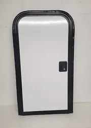 This a USED Lippert 22 x 42 Bike Door. Manufacturer: Lippert. Door color: White. Door Condition: Good.