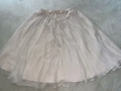 Womens A Line long Prom Party Skirt solid beige color size 24 waist up to 45”.  Elastic waist up to 45”Length 31”