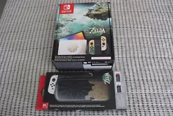 Console Nintendo Switch Oled The Legend Of Zelda Tears Of The Kingdom neuf. + pochette de transport Zelda neuf.Le jeux...
