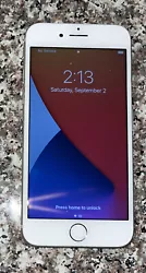 Silver Apple iPhone 7 with 128 GB. The battery’s maximum capacity is 86%. The phone settings say “your battery is...