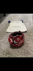 Louis Vuitton X Supreme Belt 40MM Red. This belt includes the original dustbag, but not box. It had been worn on...