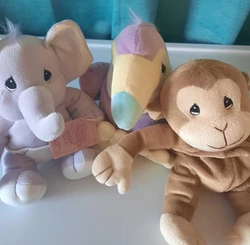 Lot of 3, as pictured. You will receive a purple elephant, a purple toucan, and a brown monkey. Small Beanie Babies...
