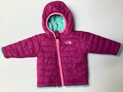 Zippered hooded reversible jacket with super soft fuzzy inside.