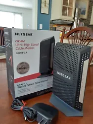 Internet Modem NETGEAR CM1000.  Almost new condition,  bought new for $185, used for one month and got another free...