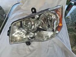 Headlight Assembly For 2011-2020 Dodge Grand Caravan Driver Side Chrome Halogen.Very good condition used headlight may...