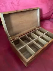 Tea bag box mad with acacia wood. Used, but good condition, some corner wear, small nicks on top that could be polished...