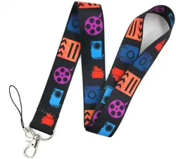 Celebrate your love of film production and directing with this ID badge keychain lanyard holder.