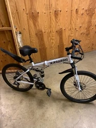 FOLDING - Quick-Release Clamp to assist in folding the bike quickly, it fits pretty much any car trunk. 21 Speed...