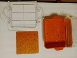 4 Piece Temp-tations by Tara Orange Polka Dot Casserole Baking Dish/ Rack/Trivet/Cover 2qt One very tiny chip shown in...