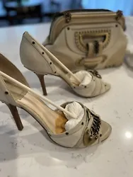 AUTHENTIC CHRISTIAN DIOR Jeanne D’orsay Ivory Pumps 37.5 W/original box, dust Bag and Receipt. Also a set of new heel...