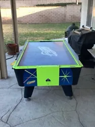 Dynamo Hot Flash Air Hockey Table.The game plays fast and the airflow is excellent. There is some wear on the playfield...