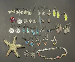 This lot is full of charms, pendants earrings and bracelet. All are beach or ocean themed. Perfect for a jewelry maker!...