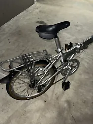 DAHON MARINER FOLDING BIKE 20” WHEEL SIZE SILVER. USED IN GOOD WORKING CONDITION NEVER CRASH OR DAMAGE ON FRAME GEARS...