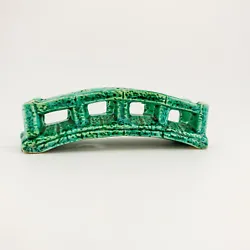 This is a vintage green glazed pottery or ceramic bridge for a fish tank. Measures just over 6 inches long. And very...