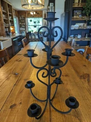 This elegant candelabra is perfect for adding a touch of antique sophistication to any room. Made of wrought iron with...
